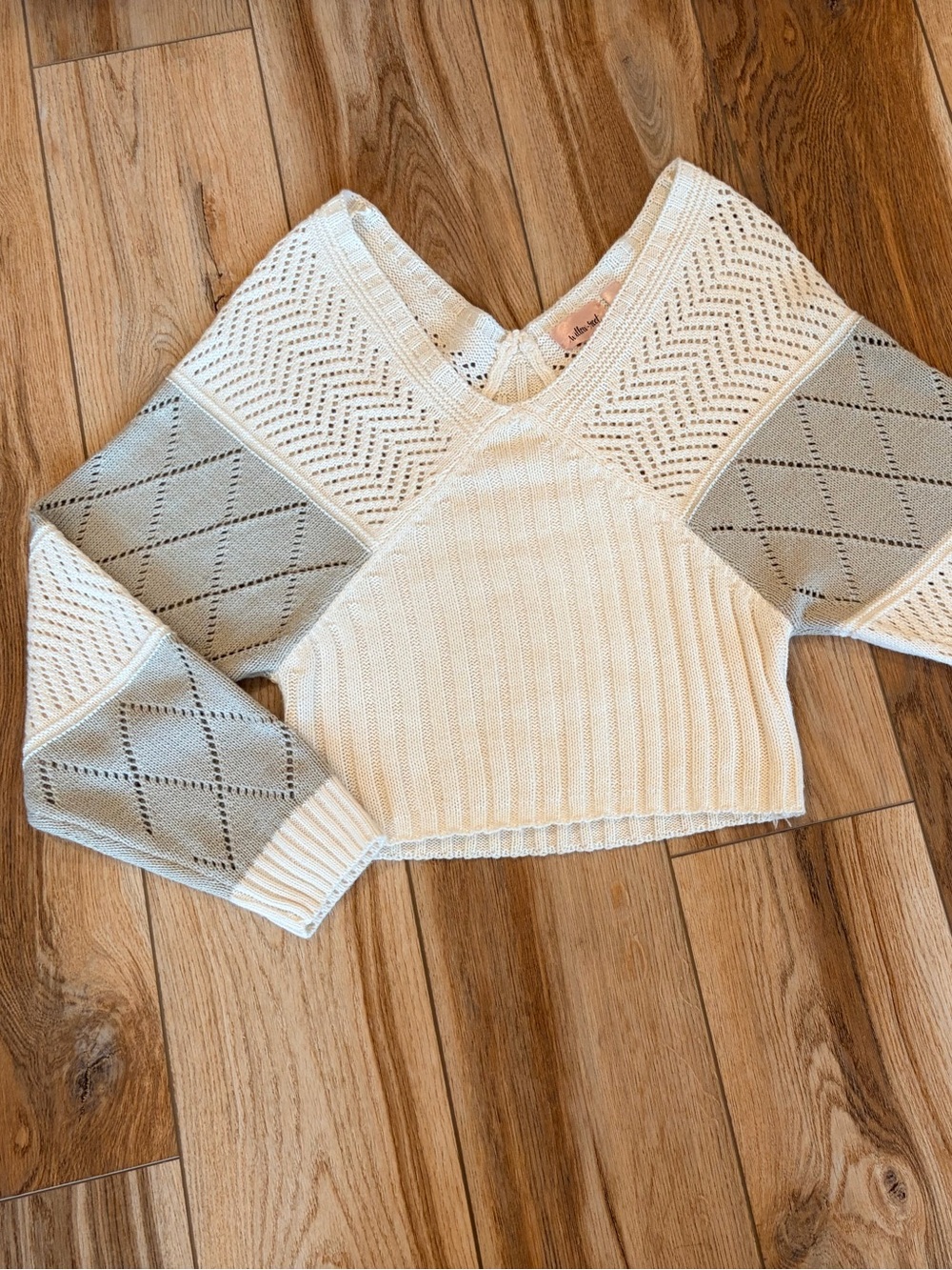Cropped Ivory Knit Sweater with Gray Diamond Sleeves